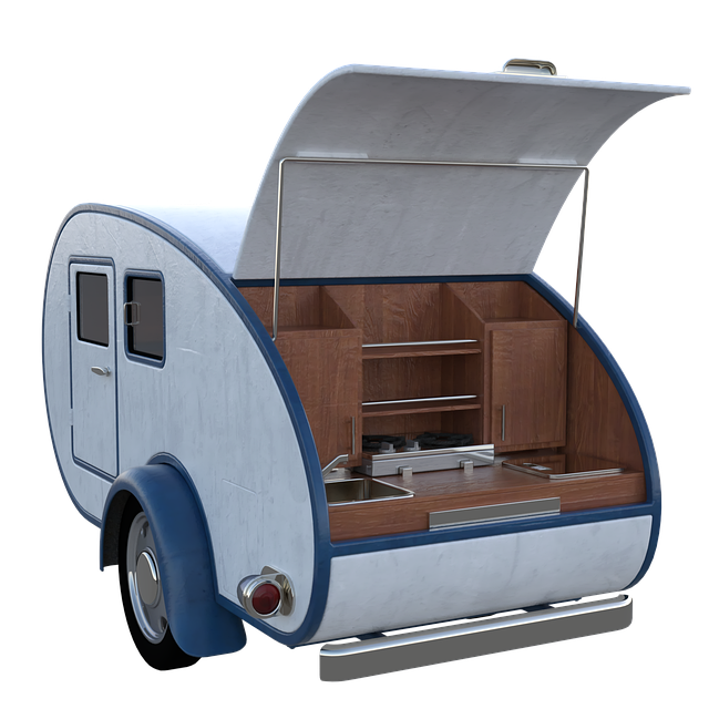 ランタンスタンドを組み立て、ランタンを吊るしているキャンパーの手元