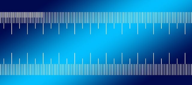 メジャーで家具のサイズを測る人