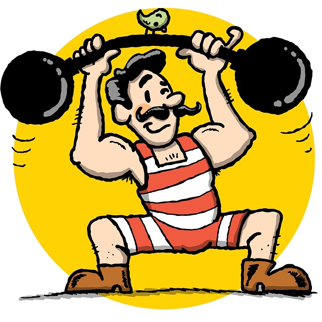 トレーニング中にパワーグリップを装着し、バーベルを握る男性